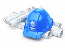 hard-hat placed on top of construction blue prints